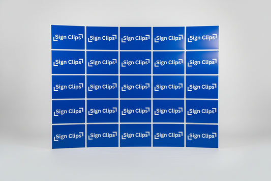 A professional display wall created by connecting multiple yard signs with Sign Clip hardware, showing a modular and sturdy backdrop setup.
